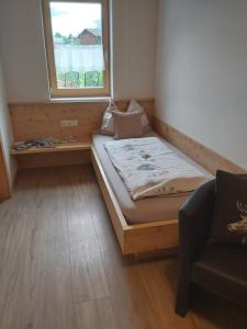 Postel nebo postele na pokoji v ubytování Appartements Vallüla Montafon