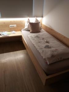 Postel nebo postele na pokoji v ubytování Appartements Vallüla Montafon