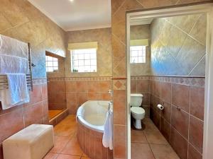 Vannituba majutusasutuses 4 bedroom Villa 1 La Mer