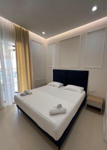 Postel nebo postele na pokoji v ubytování Mare Rooms Vlore