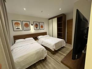 Katil atau katil-katil dalam bilik di House 98 - Boutique Hotel Stay in Zayed