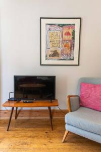 a living room with a coffee table and a couch at Margate Old Town & Beach, Stylish 3 bed House with Garden in Margate