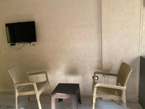 Televiisor ja/või meelelahutuskeskus majutusasutuses Sunset Hostel