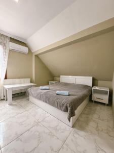 Letto o letti in una camera di Guest House "Sulo"