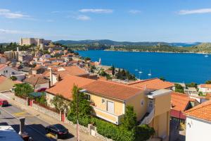a view of a town with a body of water at Moonshine apartment with magnificent view in Šibenik