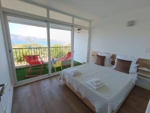 Ένα ή περισσότερα κρεβάτια σε δωμάτιο στο couché de soleil