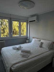 Postel nebo postele na pokoji v ubytování Modern Stay Liman