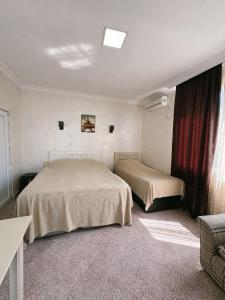 Letto o letti in una camera di Guest House "Sulo"