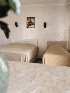 Letto o letti in una camera di Guest House "Sulo"
