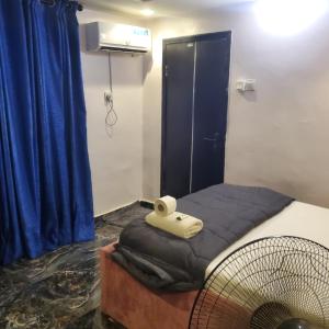Ένα ή περισσότερα κρεβάτια σε δωμάτιο στο WELTONS Apartment BABA YUSUF