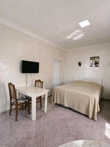 TV o dispositivi per l'intrattenimento presso Guest House "Sulo"