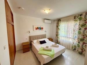 Postel nebo postele na pokoji v ubytování Apartamento Bulevar en Playa Albir