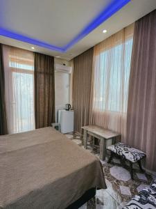 Letto o letti in una camera di Guest House "Sulo"