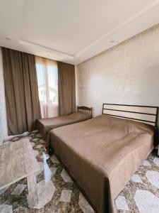Letto o letti in una camera di Guest House "Sulo"
