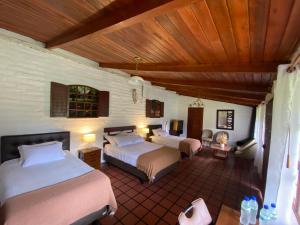 Postel nebo postele na pokoji v ubytování Quinta Sierra de Fuego + 28 fotografií