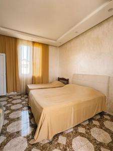 Letto o letti in una camera di Guest House "Sulo"
