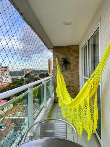 Balkon atau teras di Varandas Premium flat