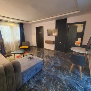 Ένα ή περισσότερα κρεβάτια σε δωμάτιο στο WELTONS Apartment BABA YUSUF