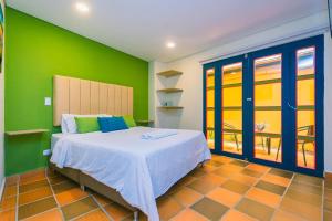 Letto o letti in una camera di Hotel Bambu Guatape
