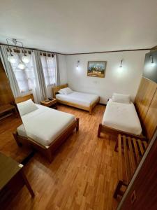 Postel nebo postele na pokoji v ubytování Hotel Vegas