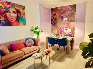 a living room with a couch and a table at BOUTIQUE LUXURY City Center in Alicante