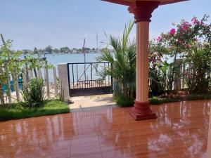 a porch with a view of the water at Casa las gaviotas in Tamiahua