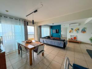 Predel za sedenje v nastanitvi Ocean View Palapa
