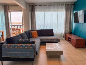 Predel za sedenje v nastanitvi Ocean View Palapa