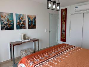 Postelja oz. postelje v sobi nastanitve Ocean View Palapa