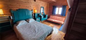 Postel nebo postele na pokoji v ubytování Parque de Campismo Rural Quinta das Laranjeiras