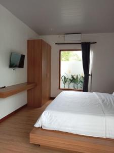 Ένα ή περισσότερα κρεβάτια σε δωμάτιο στο MADE BATU VILLA ungasan +7 φωτογραφίες