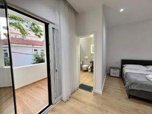 Ένα ή περισσότερα κρεβάτια σε δωμάτιο στο Villa Malaj 2