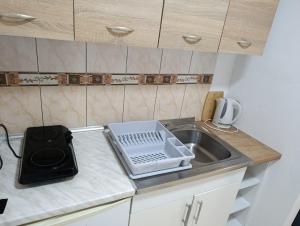 Η κουζίνα ή μικρή κουζίνα στο Aparments Plaza +2 φωτογραφίες