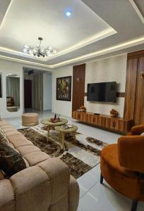 TV a/nebo společenská místnost v ubytování Luxe Haven