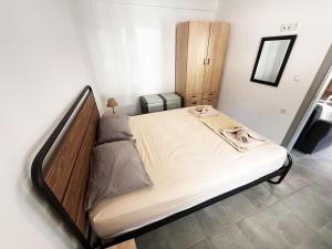 Postel nebo postele na pokoji v ubytování Thassos Forrest View Apartment