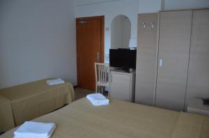 TV a/nebo společenská místnost v ubytování Hotel Caesar