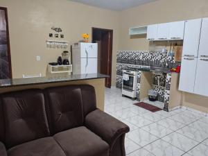 Kuchyň nebo kuchyňský kout v ubytování KL Residencial