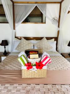 Postel nebo postele na pokoji v ubytování Yapak Beach Villas
