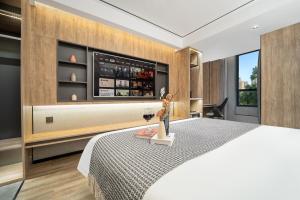 Postelja oz. postelje v sobi nastanitve Wenzhou Wuma Street Wenyuan Hotel is located in the heart of the city, easy to travel, free WiFi, breakfast, coffee, afternoon tea, free laundry service, recommended tourist attractions