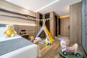 Postelja oz. postelje v sobi nastanitve Wenzhou Wuma Street Wenyuan Hotel is located in the heart of the city, easy to travel, free WiFi, breakfast, coffee, afternoon tea, free laundry service, recommended tourist attractions