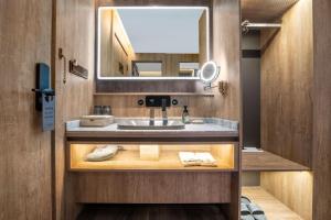 Kopalnica v nastanitvi Wenzhou Wuma Street Wenyuan Hotel is located in the heart of the city, easy to travel, free WiFi, breakfast, coffee, afternoon tea, free laundry service, recommended tourist attractions