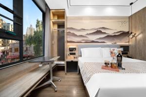 Voodi või voodid majutusasutuse Wenzhou Wuma Street Wenyuan Hotel is located in the heart of the city, easy to travel, free WiFi, breakfast, coffee, afternoon tea, free laundry service, recommended tourist attractions toas +37 fotot