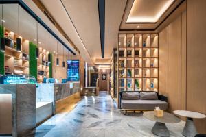 Istumisnurk majutusasutuses Wenzhou Wuma Street Wenyuan Hotel is located in the heart of the city, easy to travel, free WiFi, breakfast, coffee, afternoon tea, free laundry service, recommended tourist attractions
