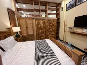 Postel nebo postele na pokoji v ubytování Anam Homestay Saigon
