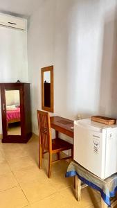 Postel nebo postele na pokoji v ubytování Bali Cottage Sambirenteng