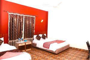 Katil atau katil-katil dalam bilik di Hotel Surya Adventure
