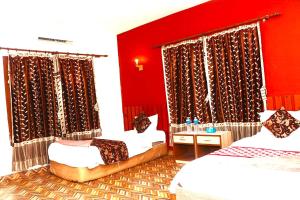 Katil atau katil-katil dalam bilik di Hotel Surya Adventure