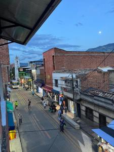 an overhead view of a street in a city at Casa del parque in Bello