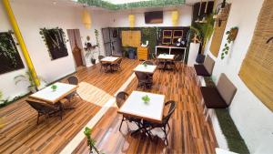 an overhead view of a restaurant with tables and chairs at HST Casa Sol Mérida in Mérida