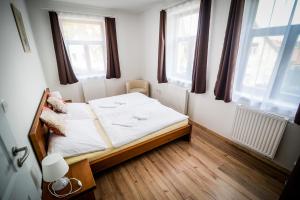 Postel nebo postele na pokoji v ubytování Dueta Apartment